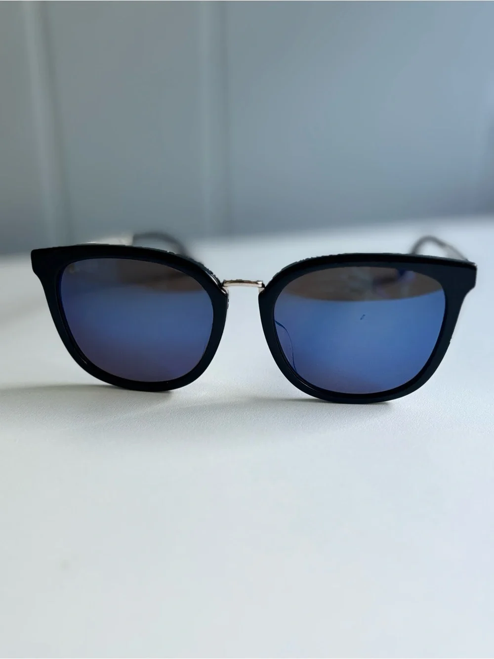 Gucci Women's Black Frame Sunglasses with Blue Mirrored Lenses